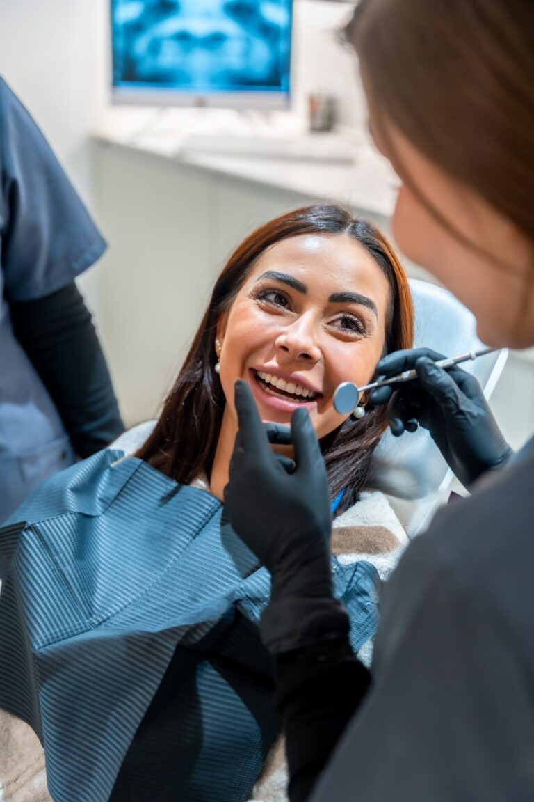 Smiling patient in a dental chair