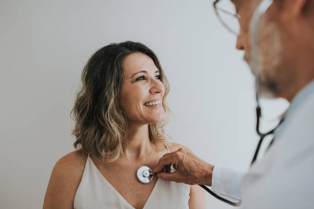 Doctor listening to a patient's heart