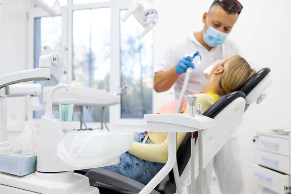 Dentist caring for a patient
