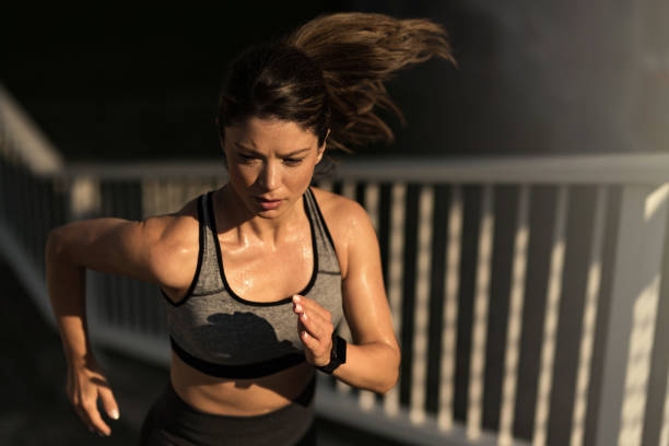 Woman running outdoors in the morning